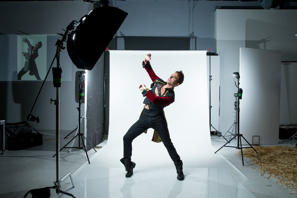 Team-building photography workshop in Sydney studio with professional lighting setup