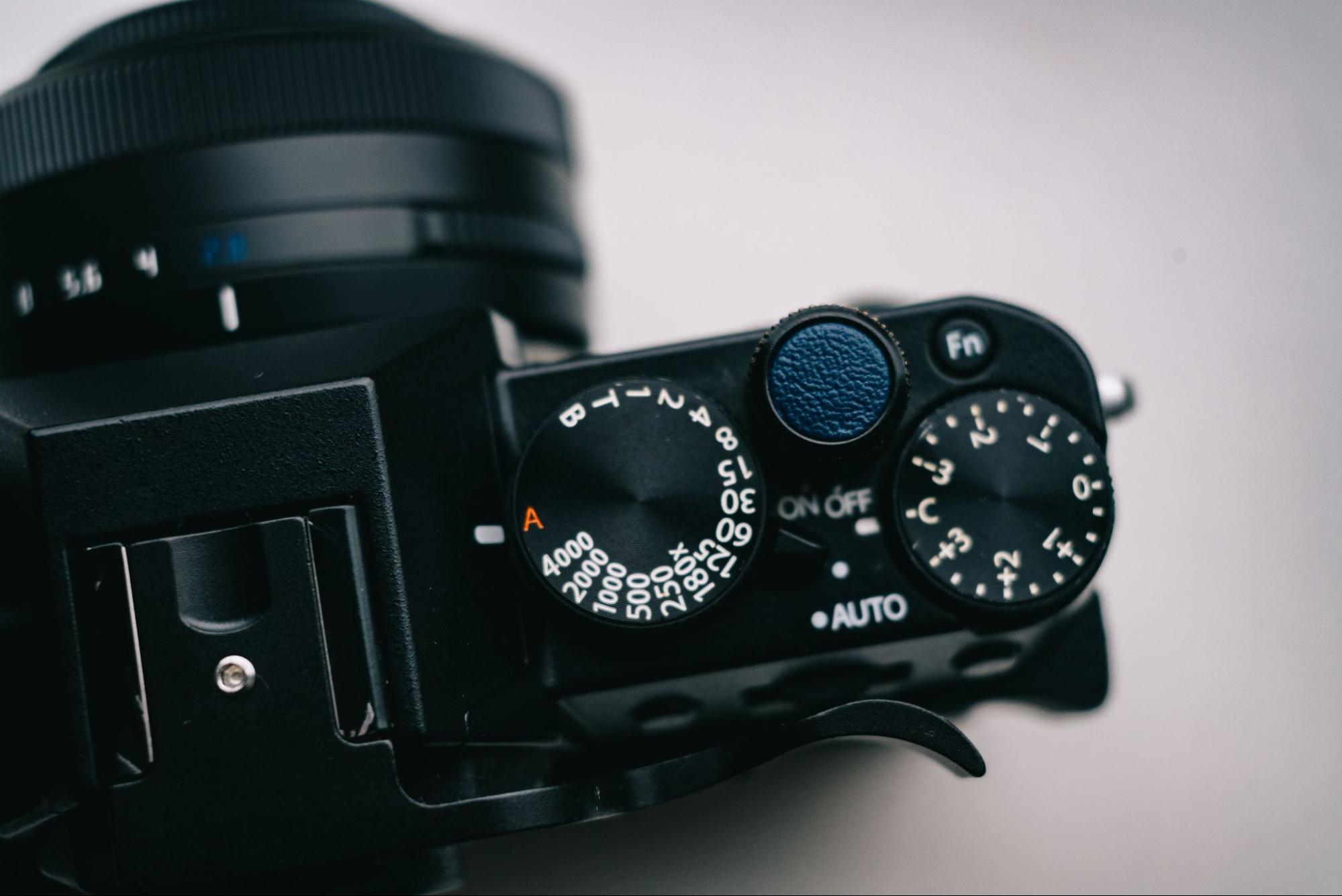 Camera top plate showing the shutter speed and exposure compensation dials